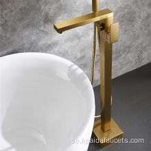 Borstat guldgolv fristående badkar kran